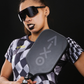 Action shot featuring the AIXO Ghost Ultra Noir paddle, blending style and high-performance spin play.